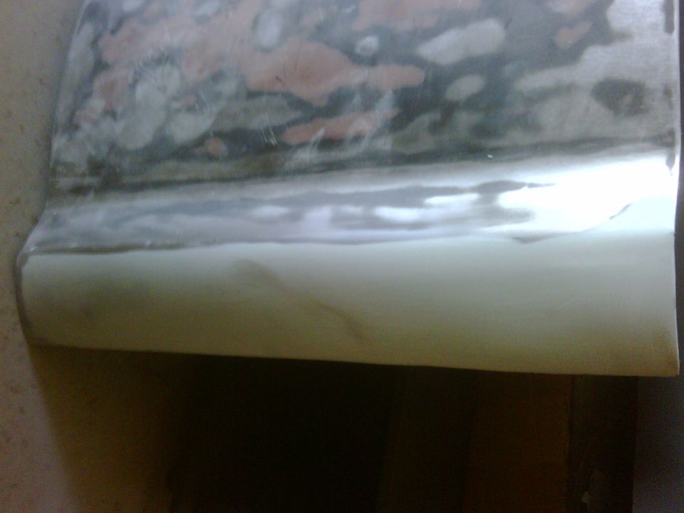 Body panel primer and filler