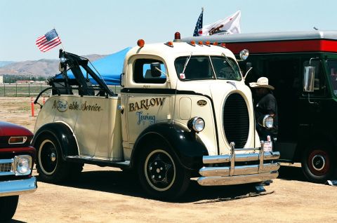 1981 Kenworth W900A - This vintage tow truck features 'Barlow Towing' on its side and is parked at an outdoor event.