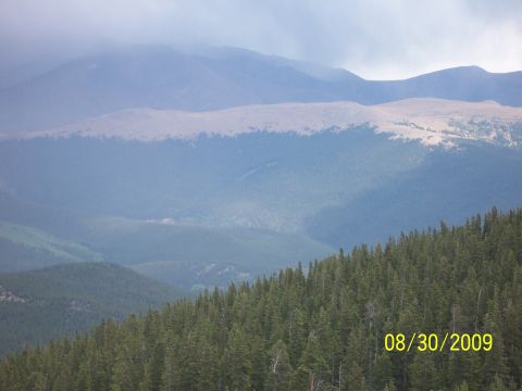 1994 Ford Bronco - A scenic view of mountains and a dense pine forest, with a date stamp of 08/30/2009 visible.