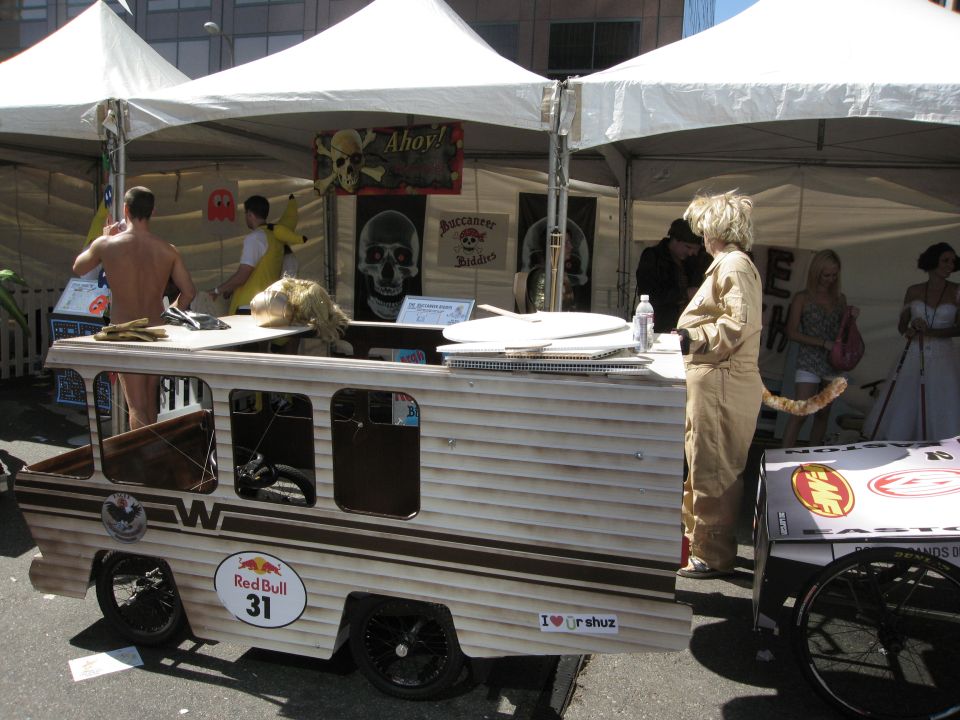 Custom trailer with wood paneling, Red Bull logo, and 'I love Dr. Shuz' sticker