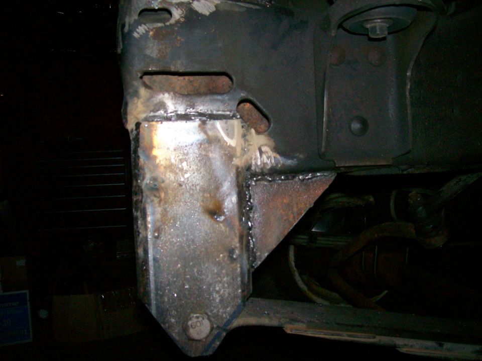 Welded frame modification with visible bolt head marked '601'