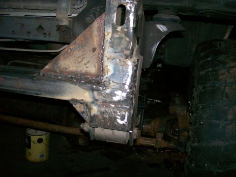 1989 Ford Bronco - Frame repair work in progress, focusing on welded sections and suspension parts.