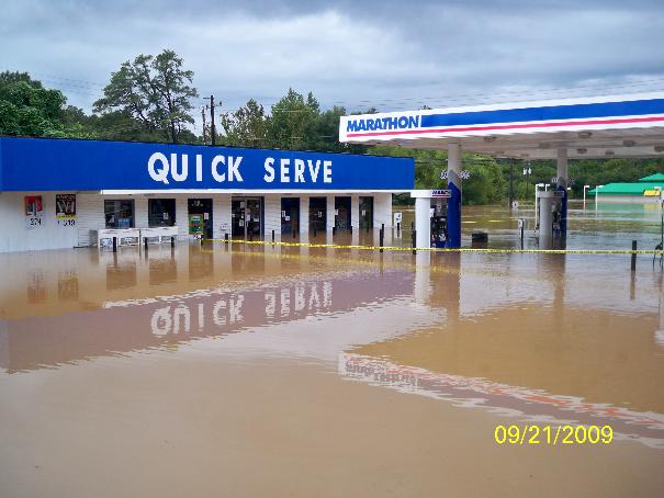 Flooded Marathon gas station with Quick Serve store, dated 09/21/2009