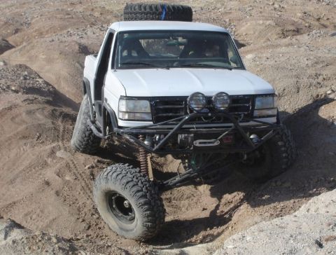 1991 Ford Bronco - This modified 1991 Ford Bronco navigates a challenging off-road course.