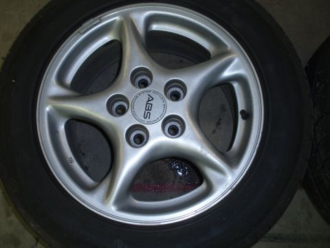 2002 Chevrolet Camaro - Close-up of a silver five-spoke wheel with the text "ABS" visible in the center.
