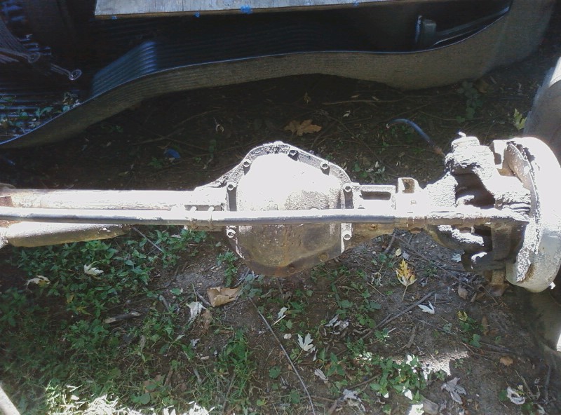 Ford rear axle assembly with differential housing and brake components