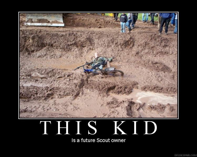 Demotivational poster of a person fallen in mud beside a bicycle