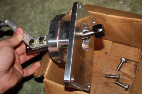 2004 Ford Mustang - A close-up view of a custom shifter assembly, possibly for a manual transmission vehicle.