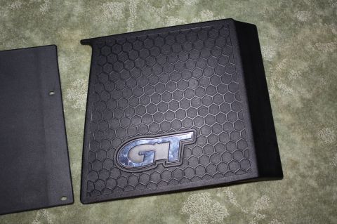 2004 Ford Mustang - Floor mat with GT emblem, likely for a Ford Mustang.