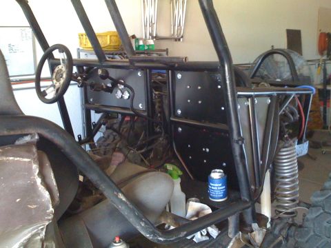 1966 Ford Bronco - Interior view of a custom-built off-road vehicle, showing its roll cage and dashboard components.