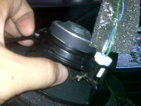 2008 Jeep Wrangler - Installing a car speaker, showing wiring connections.