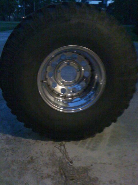 1991 Ford Bronco - This photo shows a large tire and a chrome wheel, not a 1991 Ford Bronco.