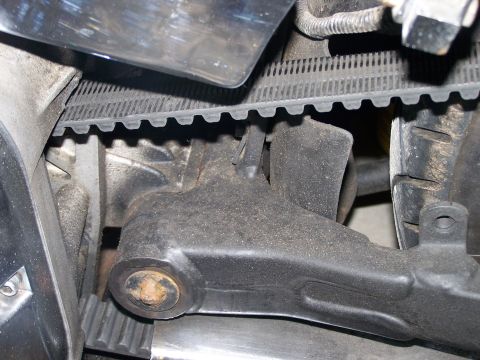 1988 Suzuki Samurai - Engine timing belt and mounting bracket detail. SuperMotors.net logo visible.