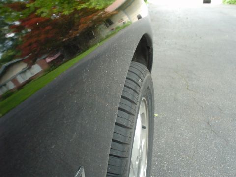 1999 Ford Taurus - These are my new shoes....225 55 R16's...the stick out of the front wheelwells!