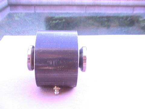 1997 Ford Ranger - A close-up view of a cylindrical automotive part with metallic accents.