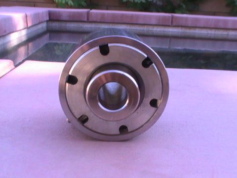 1997 Ford Ranger - A close-up view of a metal component, possibly a hub or adapter, with visible bolt holes.