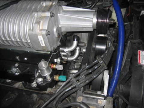 1996 Ford Thunderbird - The outlet tubes are adjustable left or right. Just make sure to install the bottom one prior to installing the lower manifold.