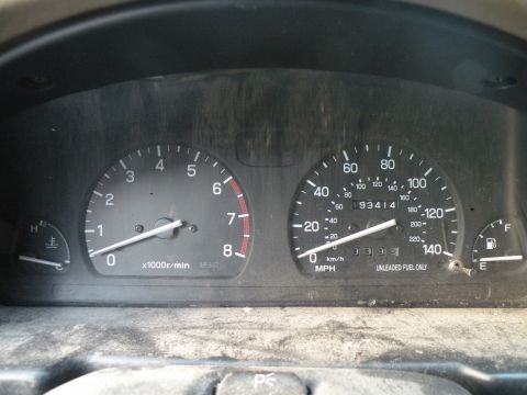 1998 Subaru Legacy - The dashboard gauges show the speedometer, tachometer, and odometer reading 93,414 miles.