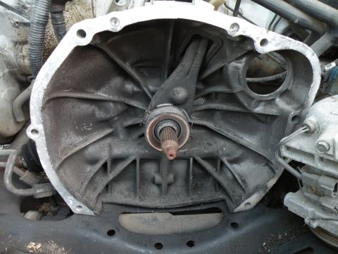 1998 Subaru Legacy - Close-up of a vehicle's clutch housing and internal components.