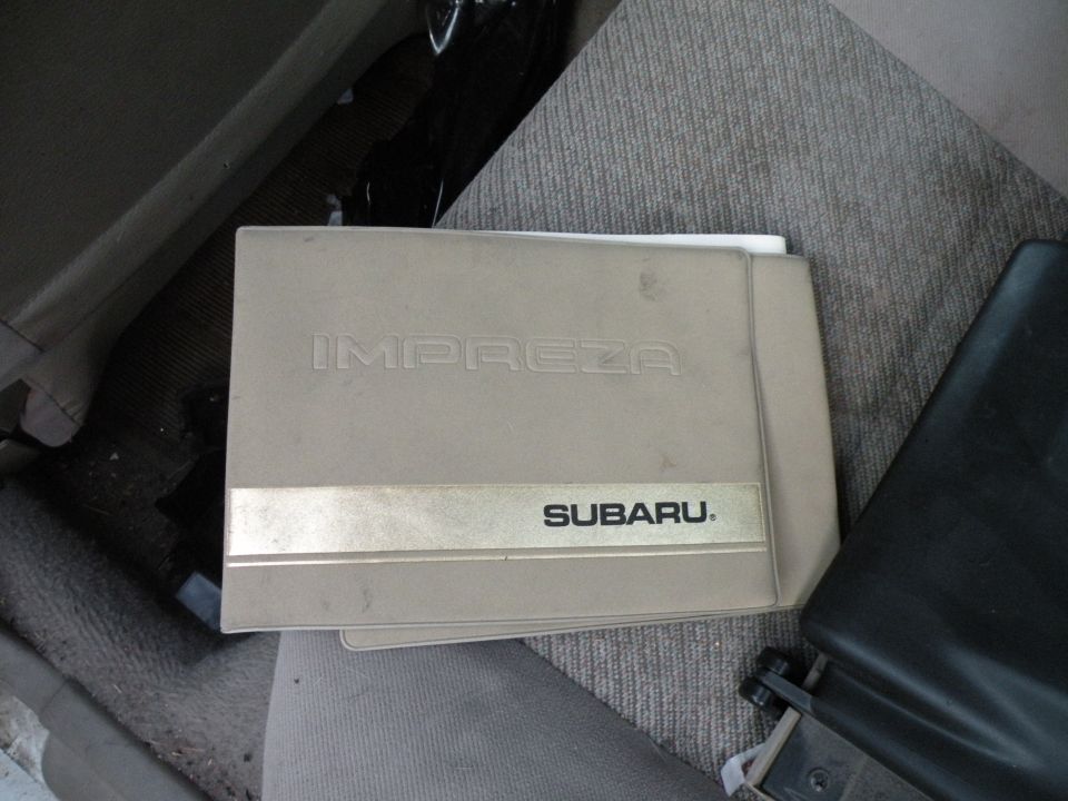 Subaru Impreza owner's manual on car seat
