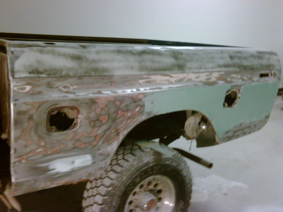 1979 Ford F-250 rear fender with body filler and fuel door opening
