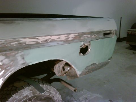 1979 Ford F-250 - This truck's rear quarter panel shows extensive bodywork and a missing fuel door, indicating it is not a 1979 model.