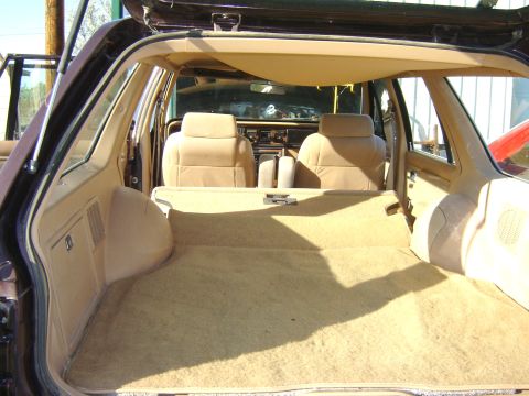 1984 Ford LTD - Interior view of a 1984 Ford LTD station wagon, showing the cargo space and front seating.