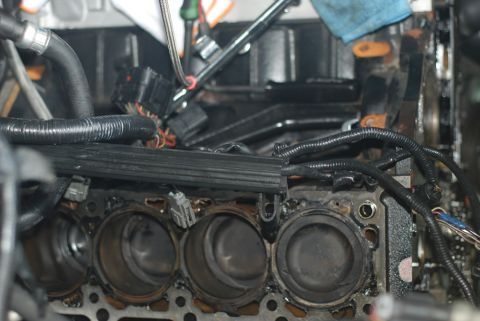 2007 Ford Mustang - Close-up view of an engine block's cylinders and wiring.