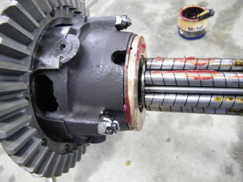 1912 Ford Model T - Close-up of a differential assembly and greased axle shafts, with a can of Mobil grease visible.