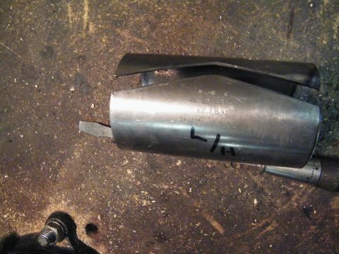 1912 Ford Model T - A metal tool part, possibly for a rear axle rebuild, is shown with 'L/H' and 'MADE IN USA' markings.