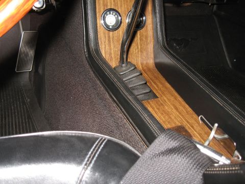 1968 Shelby GT500 - Close-up view of the center console and dashboard area of a classic car.