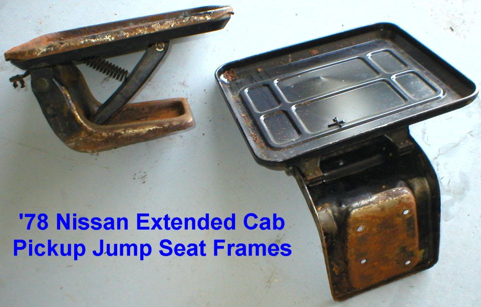 Two rusty steel jump seat frames labeled 78 Nissan Extended Cab Pickup Jump Seat Frames