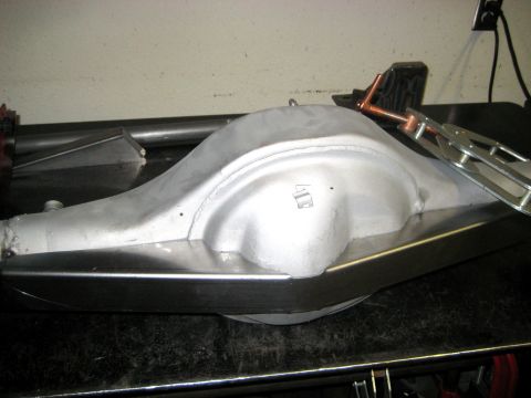 1996 Ford Bronco - A rear axle differential housing is shown with custom metal bracing.