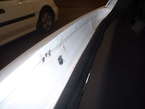 2000 Ford Crown Victoria - Holes from lip-mount antenna bracket.