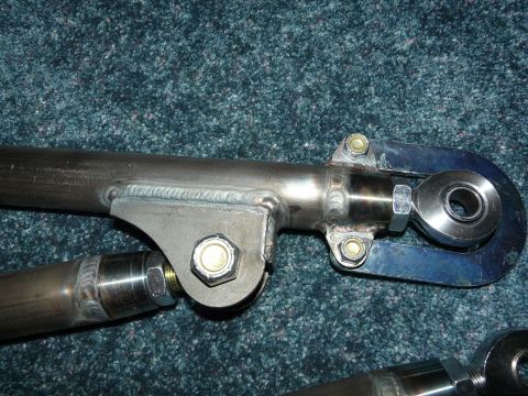 1994 Ford F-150 - Custom suspension linkage components shown with visible welds and fasteners.