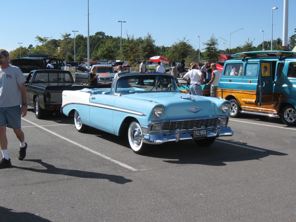 Light blue and white 1956 Chevrolet Bel Air convertible parked at a car show, license plate 742-868