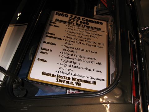 1968 Shelby GT500 - A sign details the restoration and ownership of a 1969 Z28 Camaro X77 D80.
