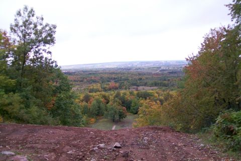 1988 Chevrolet Blazer - View of a valley during autumn, with trees showing fall colors and a town in the distance.