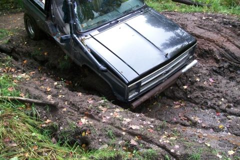 1988 Chevrolet Blazer - This 1988 Chevrolet Blazer appears to be stuck in a muddy off-road trail.