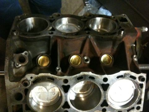 1993 Toyota 4Runner - Close-up view of an engine block, showing internal components and a website watermark.