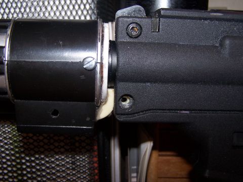 1986 Ford Bronco - A close-up view of a black mechanical part with visible screws and a white ring.