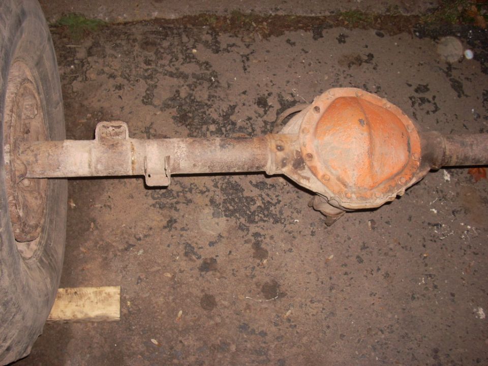 Rear axle assembly and wheel, rusty orange differential cover