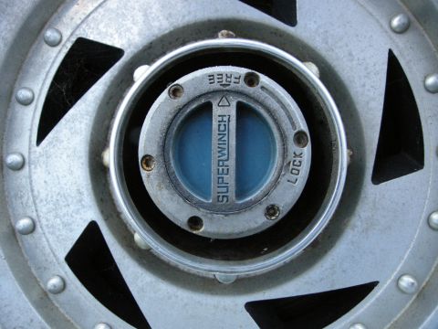 1975 Ford F-250 - A Superwinch manual locking hub is shown in the 'FREE' position on a vehicle's wheel.