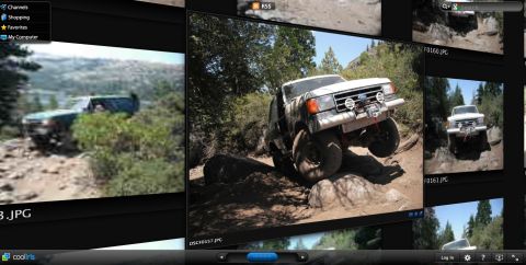 1989 Ford Bronco - White Ford Bronco navigating a challenging rocky off-road course.