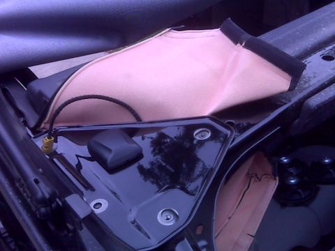 2008 Jeep Wrangler - Close-up view of an interior component covered with pink fabric, likely part of an installation or modification.