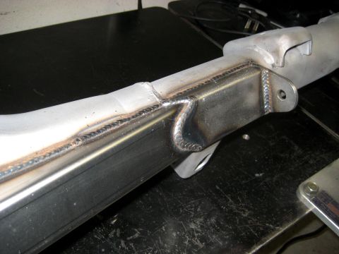 1996 Ford Bronco - Close-up view of a custom-fabricated metal frame component, showing detailed welding work.