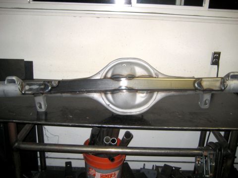 1996 Ford Bronco - Custom rear axle housing with added support bar, likely for a fabrication project.