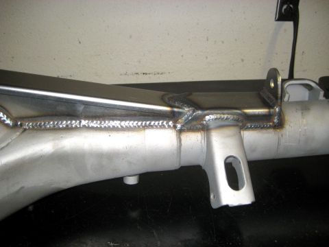 1996 Ford Bronco - A metal component with extensive welding is shown in detail.