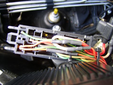 1996 Mercury Grand Marquis - The wiring was spliced into the coil power feed near the eec diode, under the relay center. Normally the outside wire goes to the coils on…