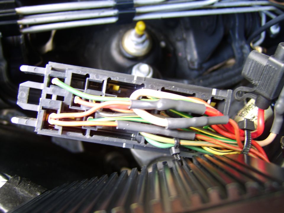 The wiring was spliced into the coil power feed near the eec diode, under the relay center.

Normally the outside wire goes to the coils on panthers, not the case on mine. Guess it is hit or miss.

The splices are soldered and covered with adhesive lined heat shrink